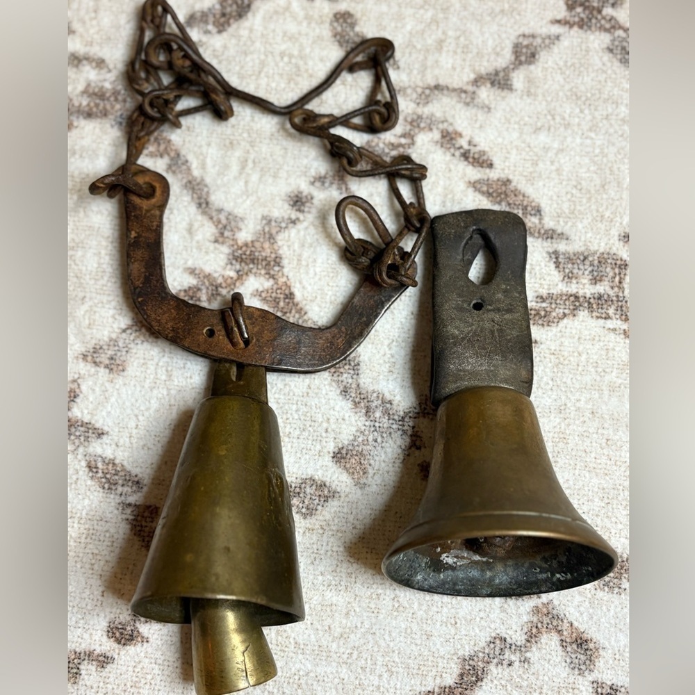2 vintage cow bells